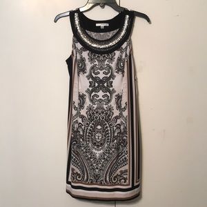 Womens dress very beautiful with Rhinestones around the neck line New w/tags